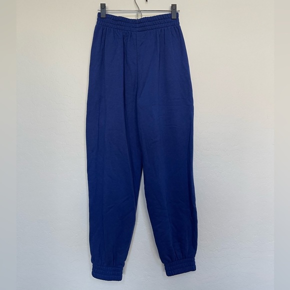 Adidas ESSENTIALS WARM GOLDEN LOGO PANTS size small - Picture 7 of 10